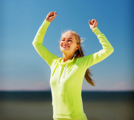 woman runner celebrating victory