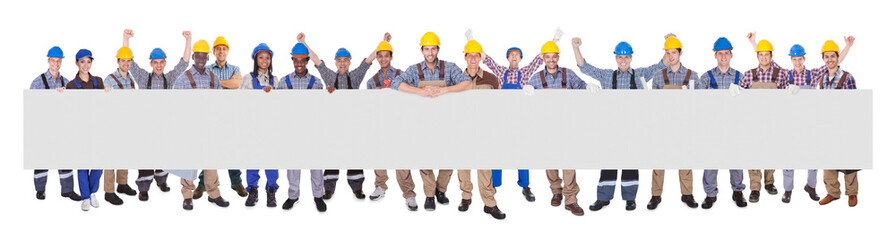 Successful Manual Workers With Blank Billboard