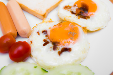 eggs with sausage and toast