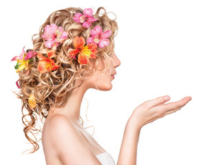 Beauty girl with flowers hairstyle and open hands - obrazy, fototapety, plakaty