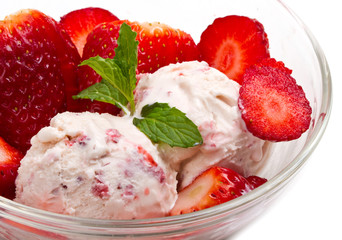 Strawberry ice cream with fruits close up
