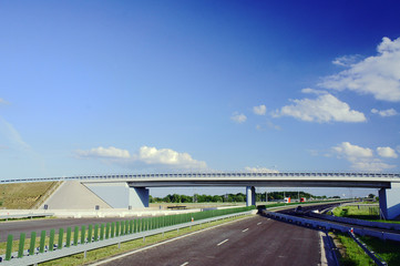 Road bridge over the highway under construction in Poland .