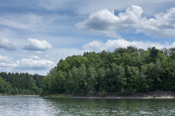 summer lake with a cloudscape