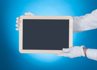 Waiter Showing Digital Tablet