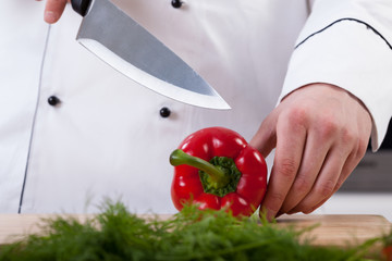 Cutting a pepper closeup