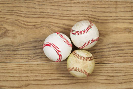 Used Baseballs on Aged Wood