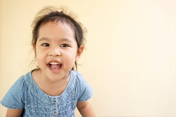 Closeup portrait of Asian little girl smiling