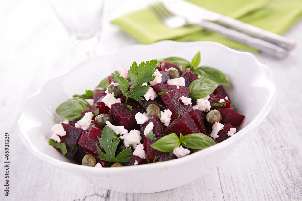 Poster beetroot salad with cheese and basil