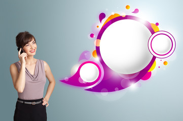 Pretty woman presenting abstract speech bubble copy space and ma