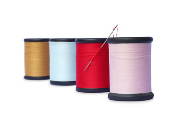 colorful sewing Threads isolated on white background