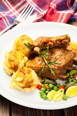 Pork spareribs served with mashed potatoes
