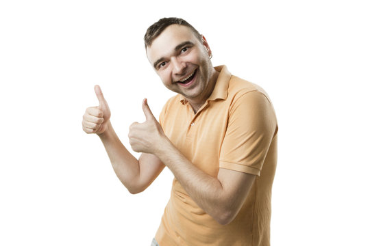 Joyful tall guy hands showing thumbs up sign