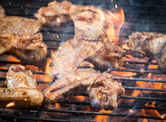 Grilled chicken wings on fire