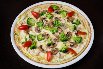 Appetizing pizza with mushrooms