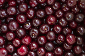 Red and black cherry in the background