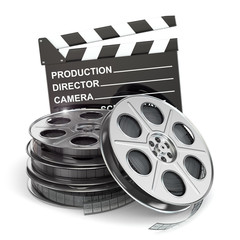 Movie concept. Film reels and clapboard