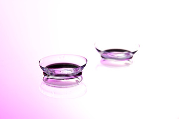 contact lenses, on pink background