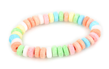 Color candies on rope isolated on white