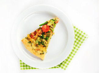 Slice of tasty vegetarian pizza on plate, isolated on white