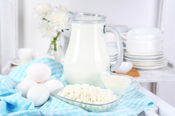 Still life with tasty dairy products on table