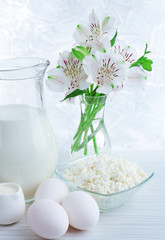 Tasty dairy products on wooden table