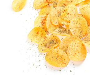Homemade potato chips isolated on white