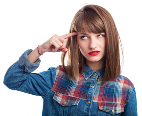 Fototapeta premium portrait of young woman doing crazy symbol gesture on white