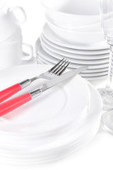 Set of white dishes close-up