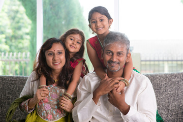 Happy Indian parents and children