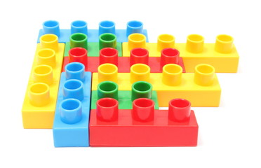 Colorful building blocks for children on white background