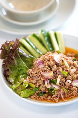 Spicy thai food pork minced salad and fresh vegetables