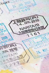 Close - up many international passport stamps