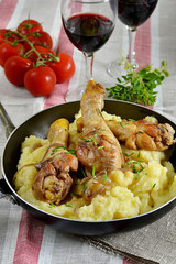 Chicken thighs with mashed potatoes