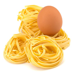 Italian egg pasta nest isolated on white background