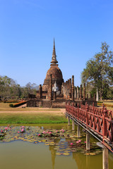 Fototapeta premium Wat Sa Si and wooden bridge, Shukhothai Historical Park, Thailan
