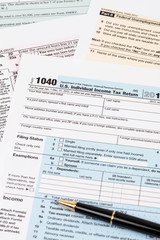 Obraz premium Tax form with pen taxation concept