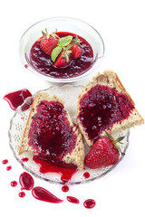 Homemade organic strawberry jam on wholemeal bread