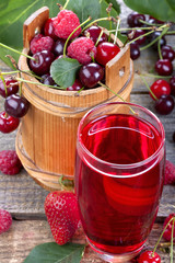 healthy juice made from strawberries, cherries and raspberries