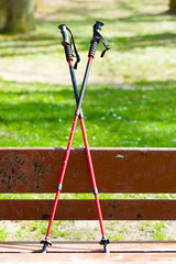 Nordic walking equipment on the park bench.