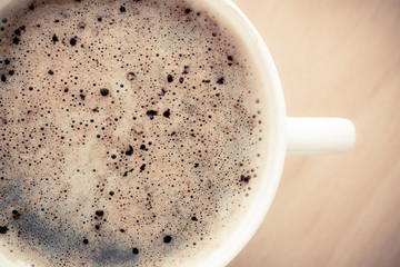 Beverage. Cup of hot drink coffee with froth.