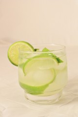 Caipirinha cocktail with limes