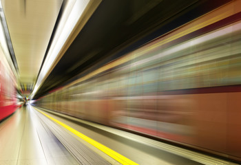 Image of subway train in motion blur.