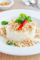 Spicy fried chicken with basil and rice