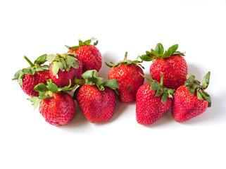 Red ripe strawberries on white background