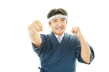 Naklejka premium ガッツポーズの寿司職人