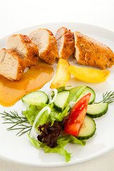 Roast chicken breast and vegetables