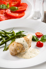 Roast chicken breast and vegetables