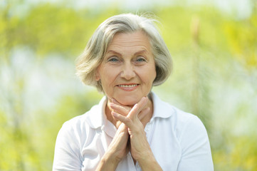 Pensive elderly woman