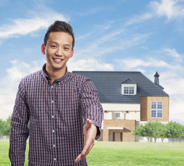 Fototapeta premium portrait of young asian man doing a welcome gesture