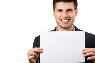 Smiling young business man,showing a white card.